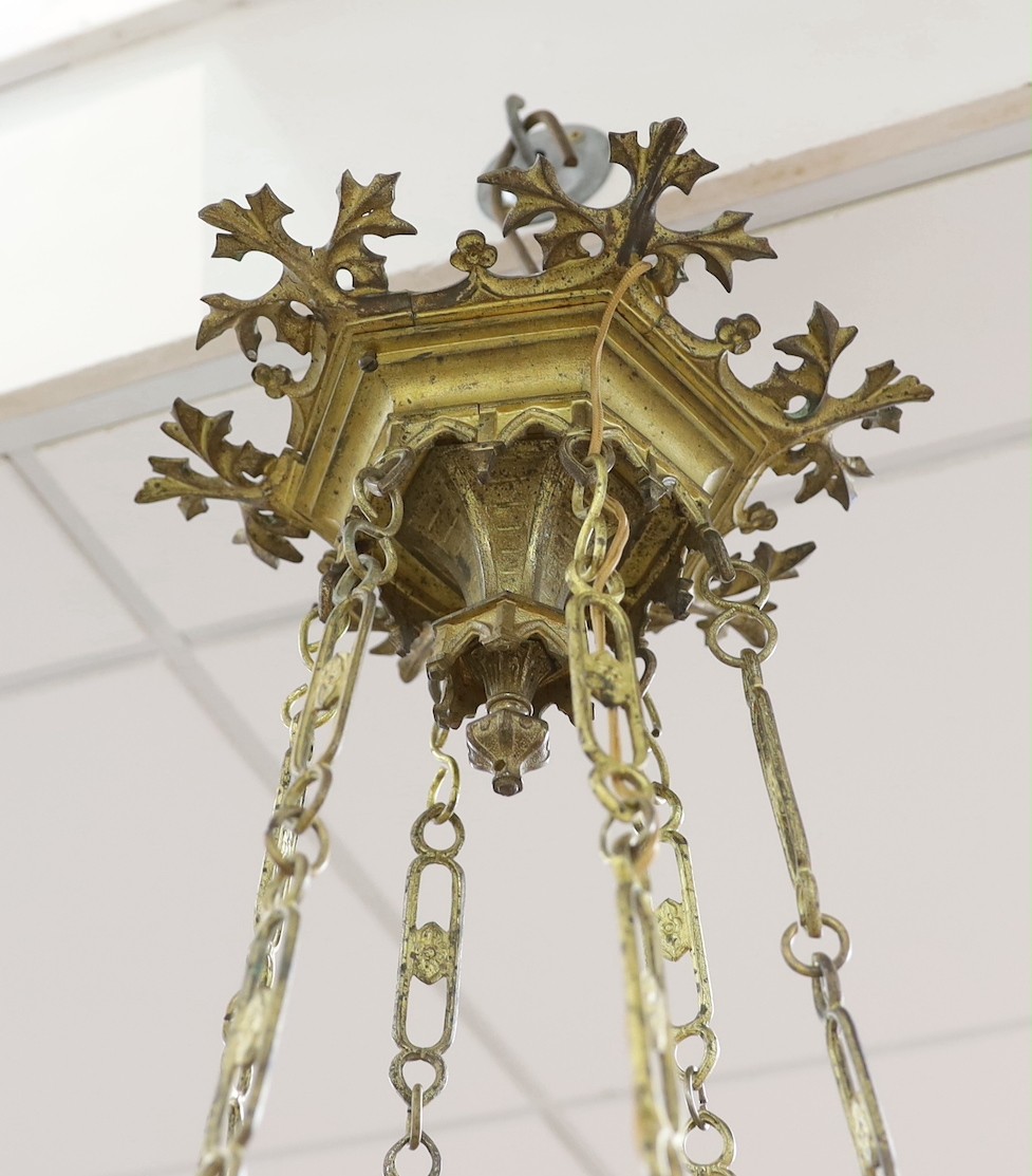 A Neo Gothic 19th century ormolu three light ceiling light, 115cm drop from rose